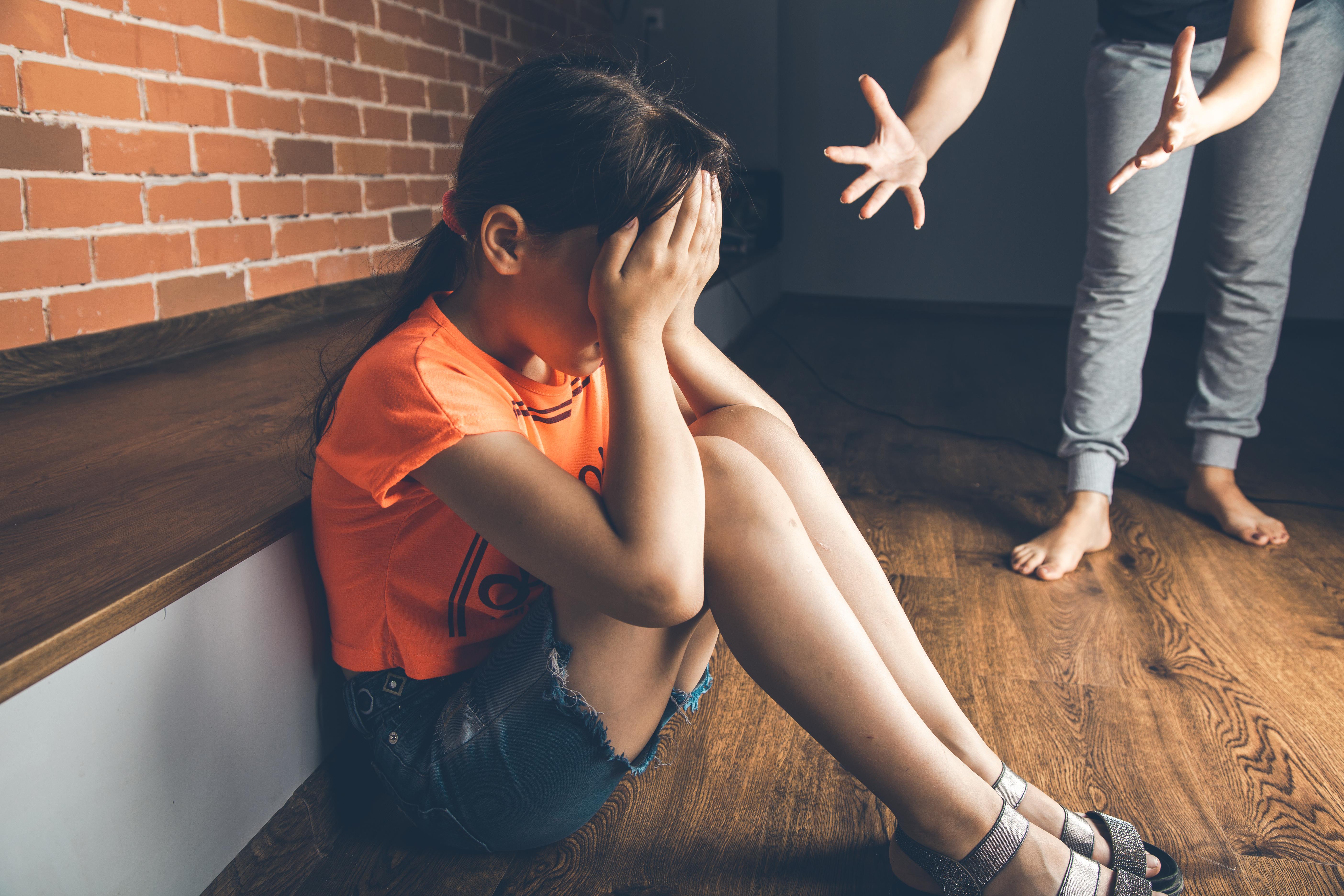 angry-woman-with-sad-baby-home