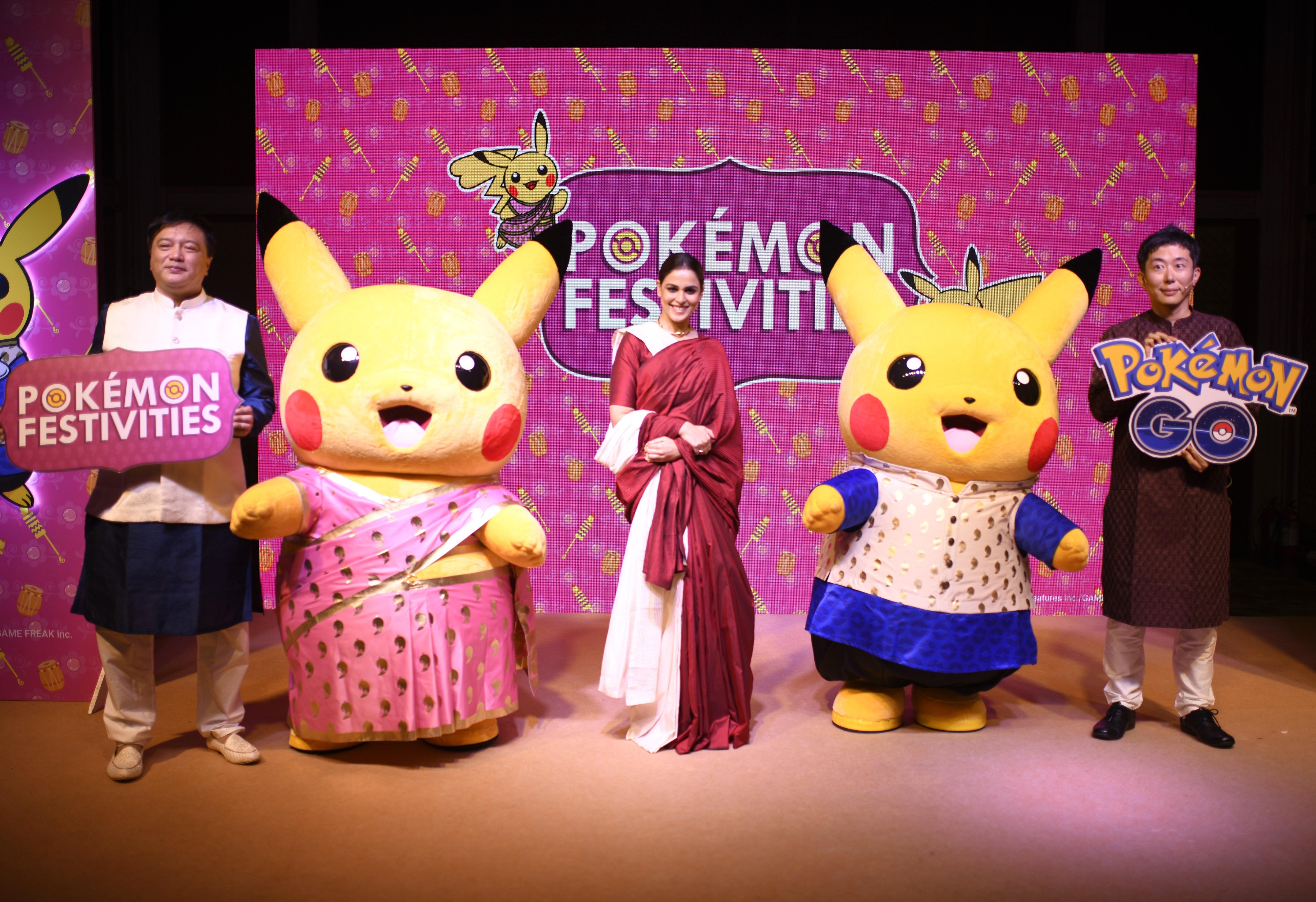 Photo 1 - (From left to right) Susumu Fukunaga, Pikachu wearing a saree; Genelia Deshmukh; Pikachu wearing a kurta; Yuki Kawamura