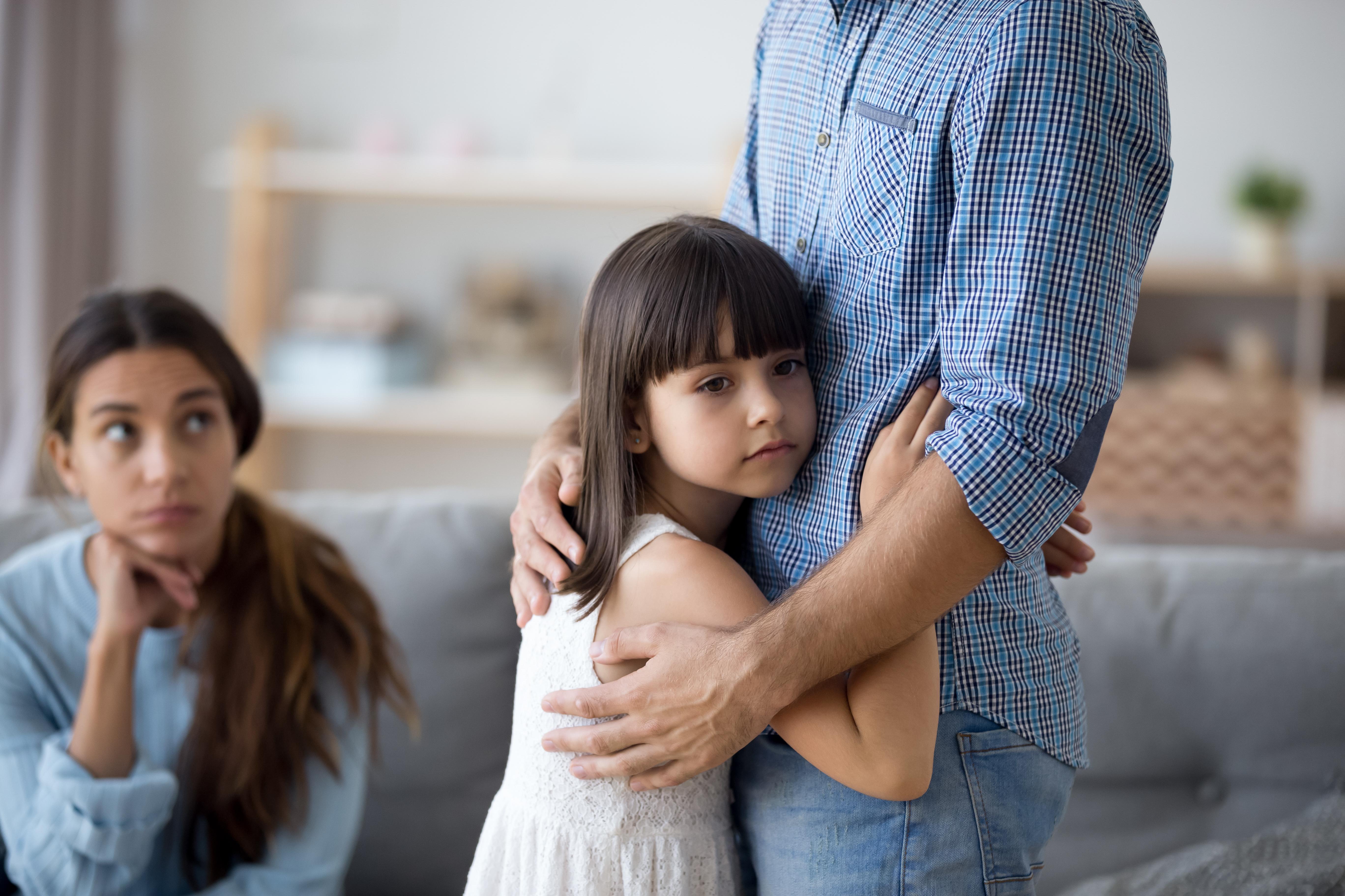 unhappy-little-child-hug-leaving-parent-say-goodbye